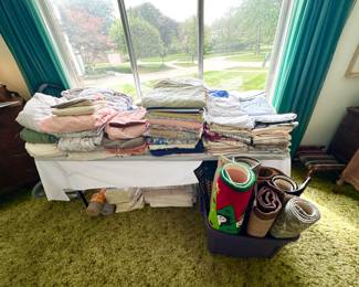 Bed linens, tablecloths & floor rugs.