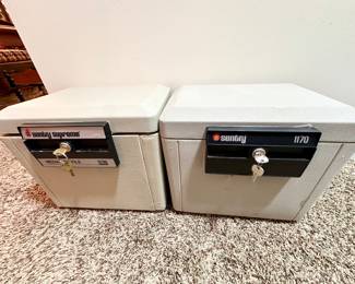 2 small Sentry safes, with key.