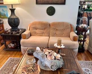 Living room 2-seater couch & Asian style coffee table.