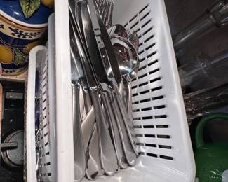 Several sets of stainless steel flatware to choose from.