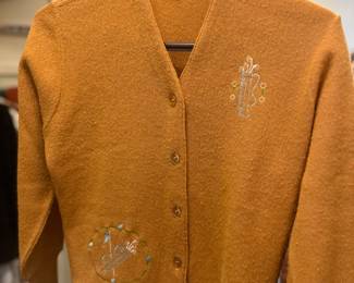 Cute ladies golf cardigan sweater.