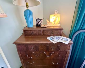 Pretty dresser with top drawers.