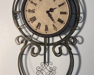 Metalwork wall clock.