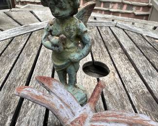 Deck holds many garden decor items!