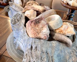 Ceramic driftwood vessel with natural filler.