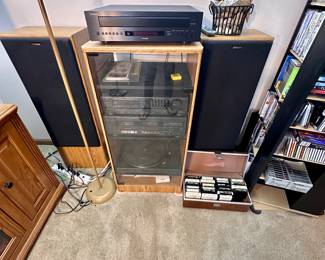 Yamaha cd player, turntable, Fisher receiver & Fisher speaker components in cabinet.