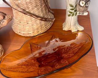 Amber glass dish.