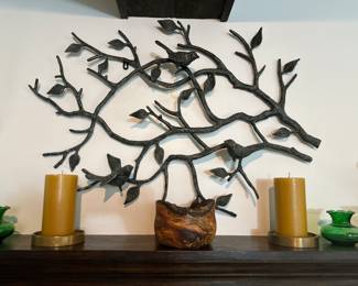 Nature inspired wrought metal wall decor.