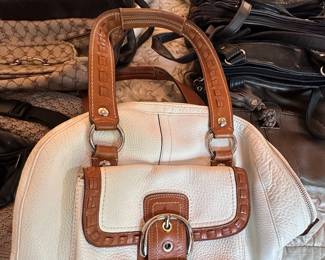 Many excellent ladies' purses, including this Coach bag.