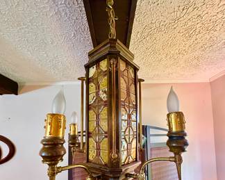 4-arm swag lamp with multiple switch settings.