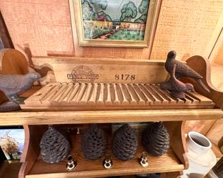 Cigar press, salt iron birds and pinecones.