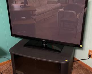 Samsung T.V.,  T.V. Stand