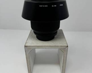 Nikon AF Nikkor 28-105mm +  B&W Filter + Nikon HB-18 | Est. $365	