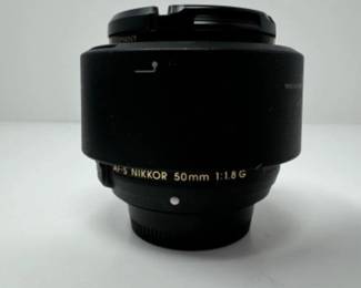 Nikon AF-S Nikkor 50mm 1:1.8G + B&W filter | Est. $220+	