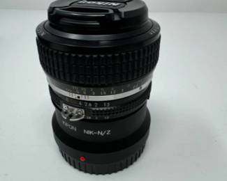 Nikon Nikkor 50mm 1:12 417206 | Est. $725	