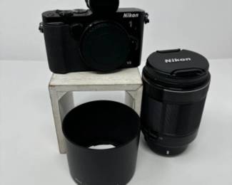 Nikon 1 (V3) + Nikkor 70-300 VR + Nikon HB N110 + Hoya Filter | Est. $1,500+