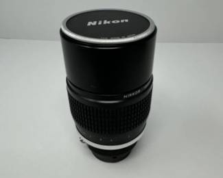 Nikon Nikkor 180mm 1:28 | Est. $390	