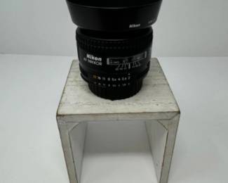 Nikon AF Nikkor 35mm 1:2D + Nikon HN-3 | Est. $390	
