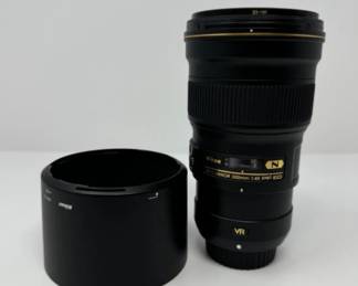 NIKON AF-S Nikkor 300mm Nano Crystal Coat & B+W UV Lens | Est. $2,050	