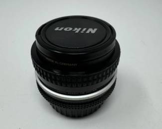 Nikon Nikkor 20mm 1:4 136251 + B&W filter | Est. $280+	