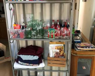 Shelf with Cookbooks, Coca Cola (Bottles, Mug and Trinkets), Table Cloths, Charger, Ceramic Heart Shape Serving Bowls