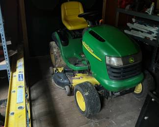 John Deere riding lawn mower