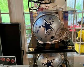 Full size helmets signed with COA’s 