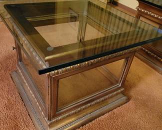 Pair of tables used as coffee table. display