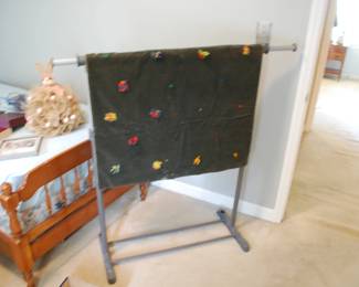 Clothes hanger and small quilt