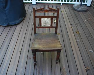 Unusual antique Chair with a tile insert,