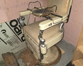 Antique Theo A. Kochs hydraulic barber chair. Needs some TLC but everything is there except the head rest. Even includes the child's seat which is rare!
