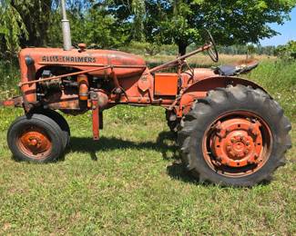 Allis Chalmers CA, this model built from 1949 through 1959. Runs excellent! Good Tires. Fun to drive! Several implements, chains and snow plow.