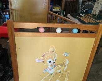 1960's crib with darling fawn artwork. This does not meet current safety standards for infants. But so darn cute.