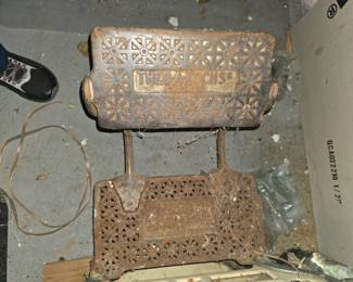 The foot rest, rusty but readable. Made in Chicago in the 1920's and 30's