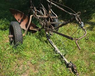 Double Bottom 12" Oliver plow, tractor pull. Tires are not good.