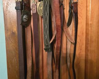 Men's leather belts, some with very cool buckles
