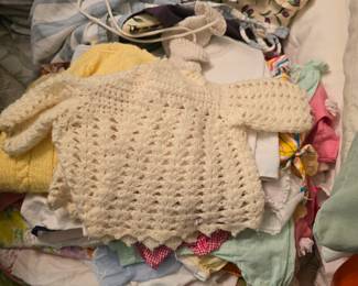 A pile of 1960's/70's baby clothes.