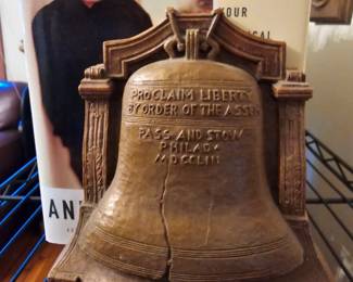 One of a pair of heavy metal bookends