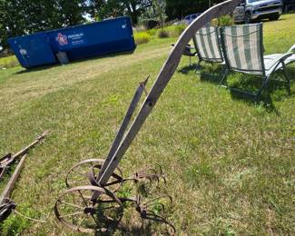 Push Cultivator with a broken wood handle.
