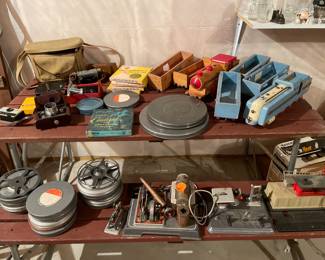 Cameras, 8 mm reels, vintage train equipment, 2 cool wooden train sets