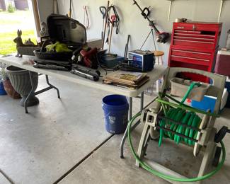 Chainsaw, weed eaters, leaf blowers, lots of hand and yard tools