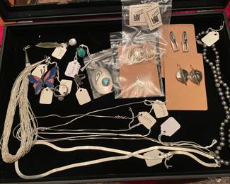 Sterling silver necklaces, earrings, rings and pins