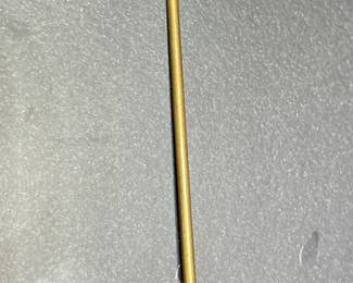 Antique lion head with ruby eyes stick pin