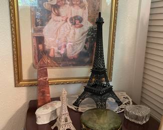 eiffel tower figures, small jewelry boxes, and large standing jewelry box