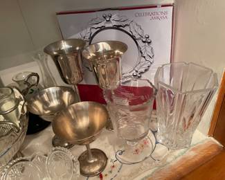 Silver goblets , crystal vase