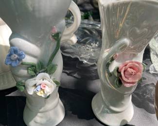 Ceramic hand with flowers vases 