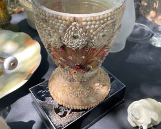 Bowl made of small sea shells 