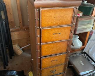 Vintage leather cabinet with drawers and leather pockets on one side 