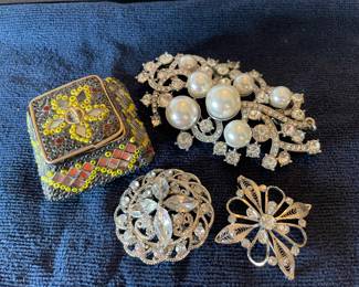 Brooches and small box 
