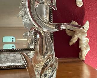 glass dolphin on wave figure